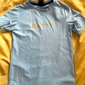Light blue Nike shirt